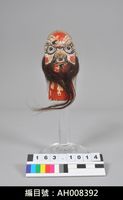 藏品(布袋戲偶頭-紅大花)的圖片